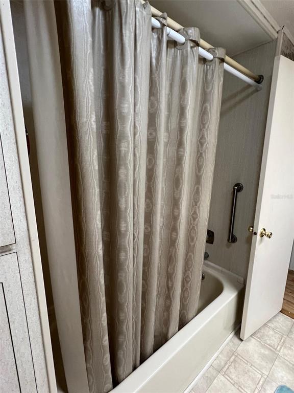 701 Sugar Palm Street Largo, FL 33770 - Photo 21 of 30 a view of a bathtub in a window