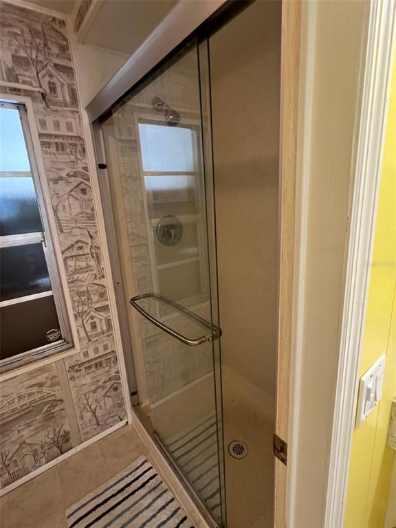 701 Sugar Palm Street Largo, FL 33770 - Photo 29 of 30 a bathroom with a shower