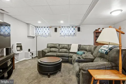 a living room with furniture and a couch