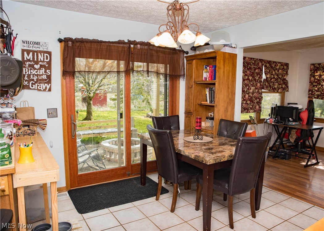 3810 Dawley Road Ravenna, OH 44266 - Photo 7 of 35 1st Floor = Breakfast Nook with Sliding Door out to Pavilion