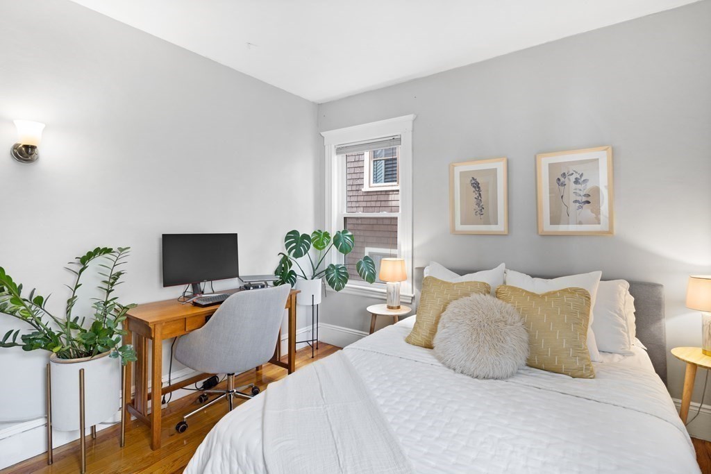 32 Parkton Road, Unit 2 Boston, MA 02130 - Photo 17 of 23 a bedroom with bed a computer on the desk and chair