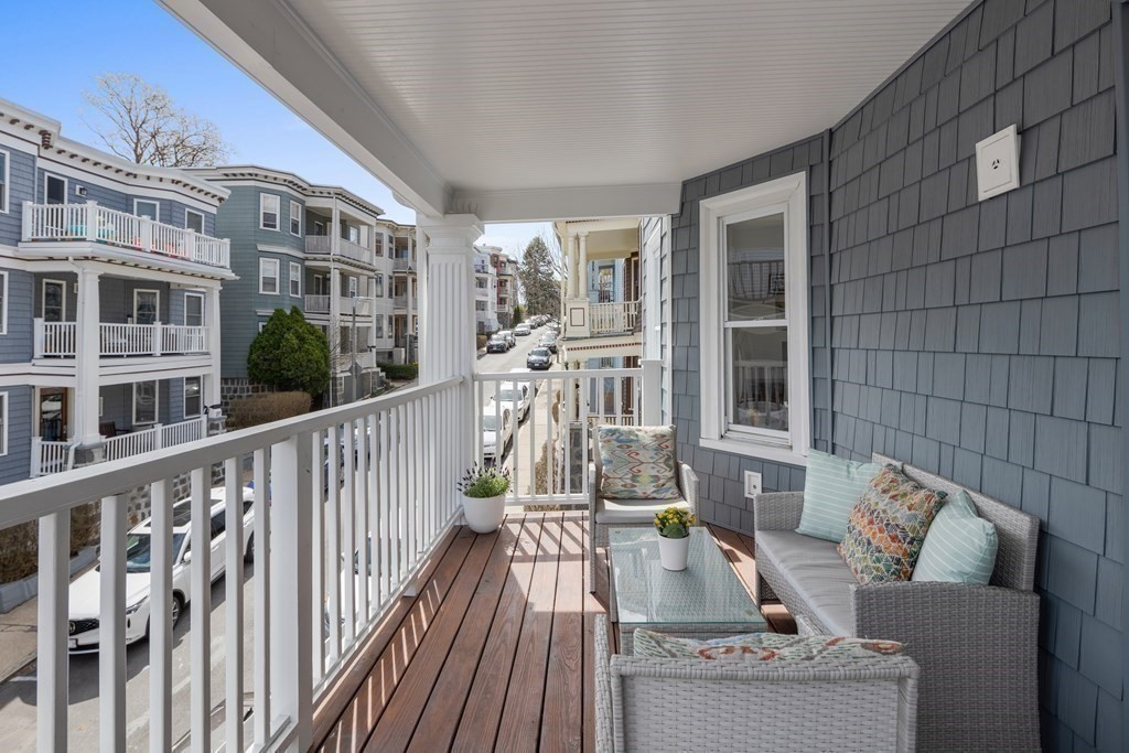 32 Parkton Road, Unit 2 Boston, MA 02130 - Photo 19 of 23 a view of roof deck with couches and potted plant