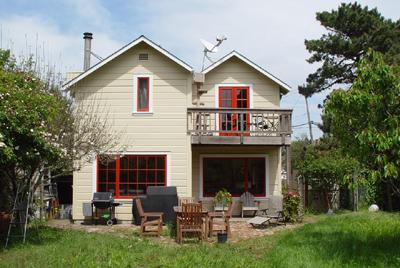 251 B Street Point Reyes Station, CA 94956 - Photo 1 of 8 Rear of House with patio and view of master bedroom deck