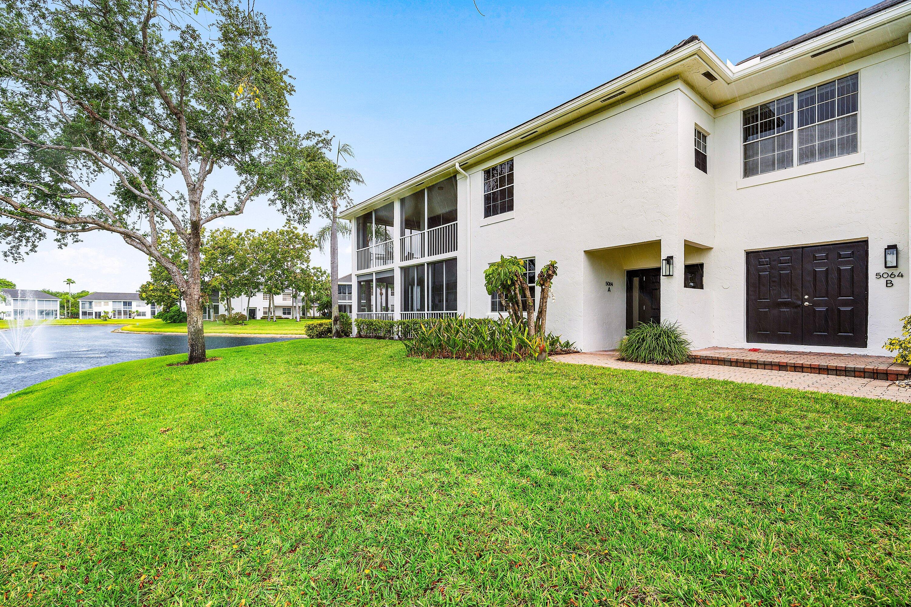 5064 Lake Catalina Drive, Unit A Boca Raton, FL 33496 - Photo 5 of 52 Side Exterior