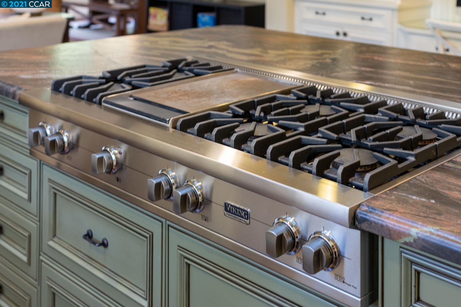 Undisclosed Address Diablo, CA 94526 - Photo 16 of 40 a close view of a stove a sink and dishwasher