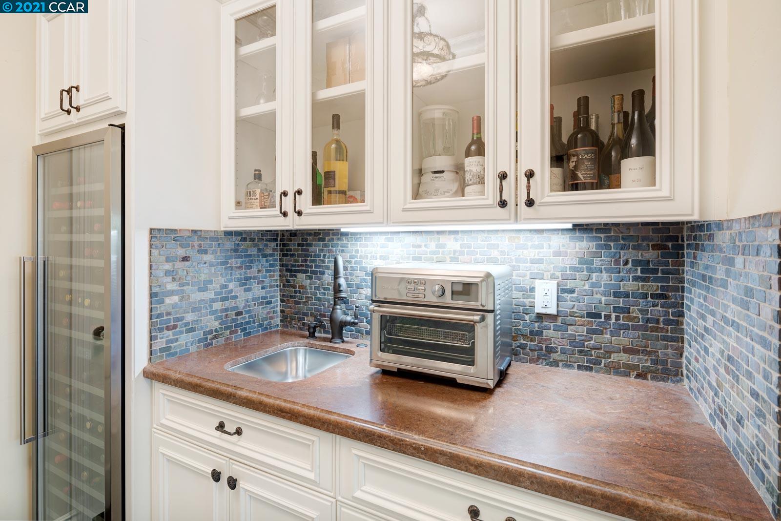 Undisclosed Address Diablo, CA 94526 - Photo 19 of 40 a bathroom with a sink and a mirror