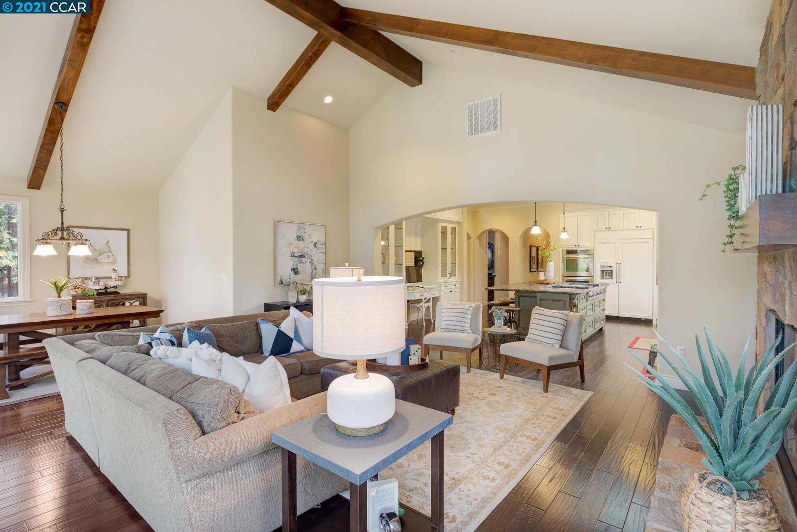 Undisclosed Address Diablo, CA 94526 - Photo 23 of 40 a living room with furniture and wooden floor