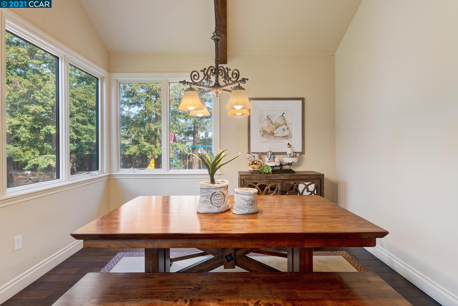 Undisclosed Address Diablo, CA 94526 - Photo 27 of 40 a view of a dining room with furniture window and outside view