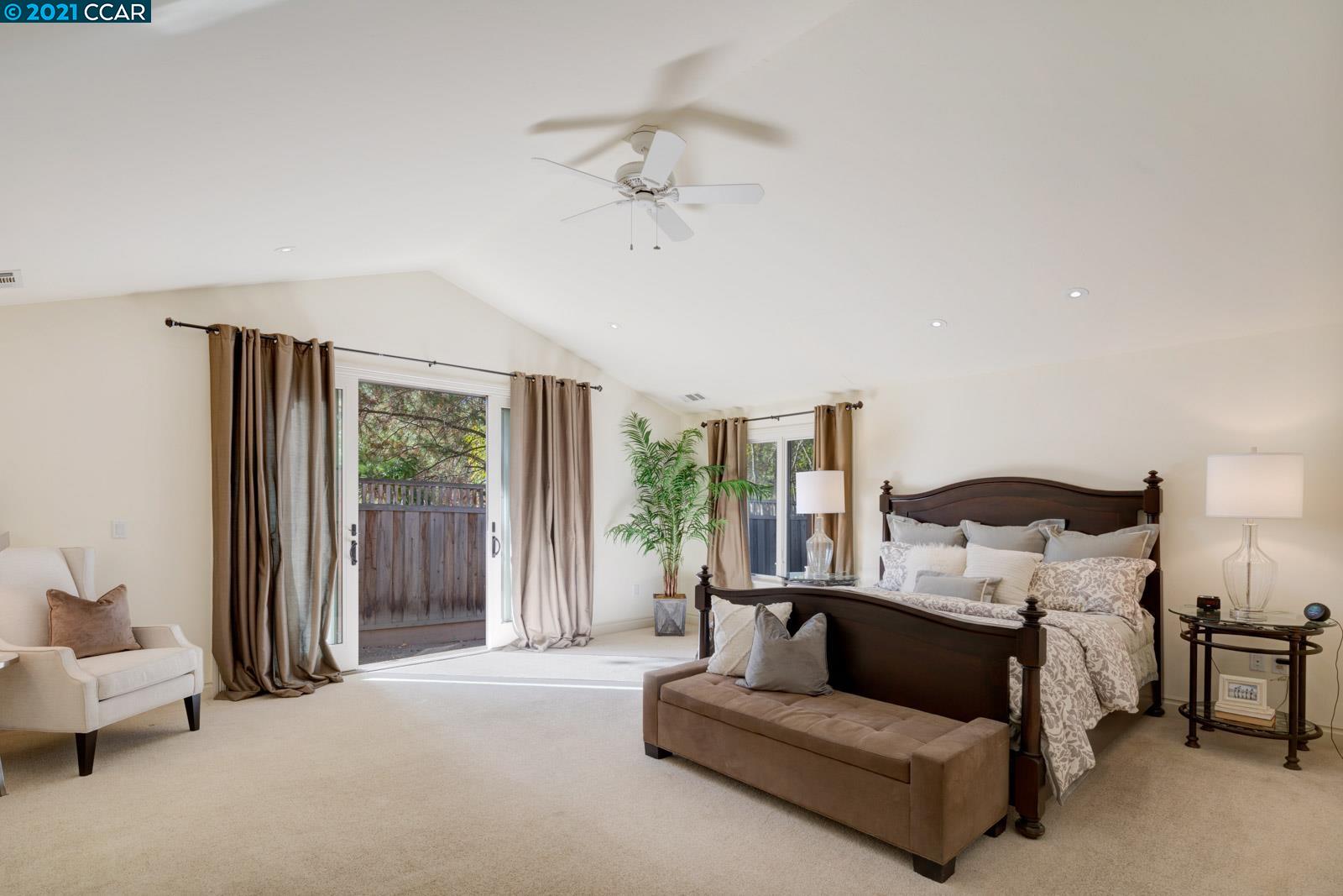 Undisclosed Address Diablo, CA 94526 - Photo 30 of 40 a living room with furniture and a large window