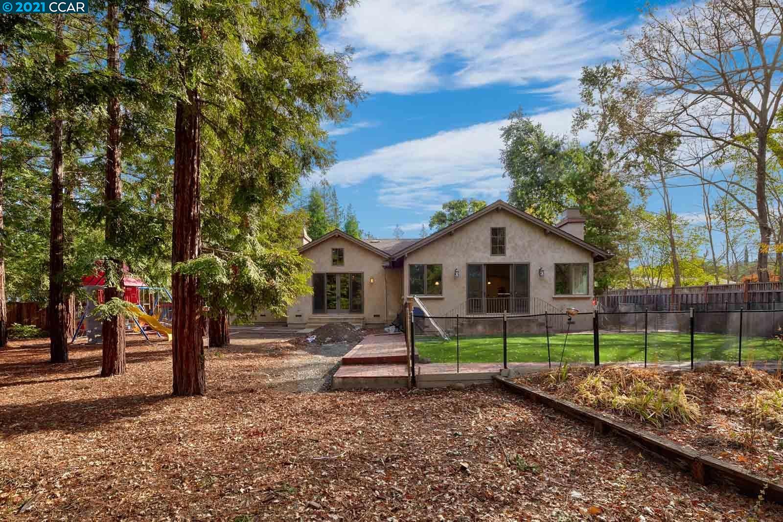 Undisclosed Address Diablo, CA 94526 - Photo 39 of 40 a view of house with a yard and hanging chair