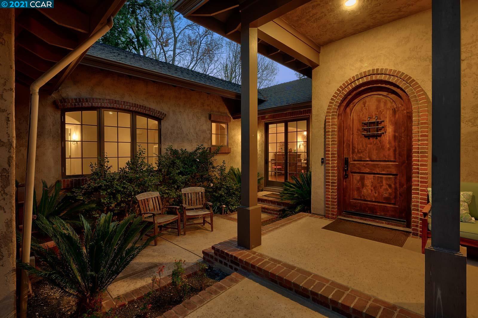 Undisclosed Address Diablo, CA 94526 - Photo 5 of 40 a living room with furniture