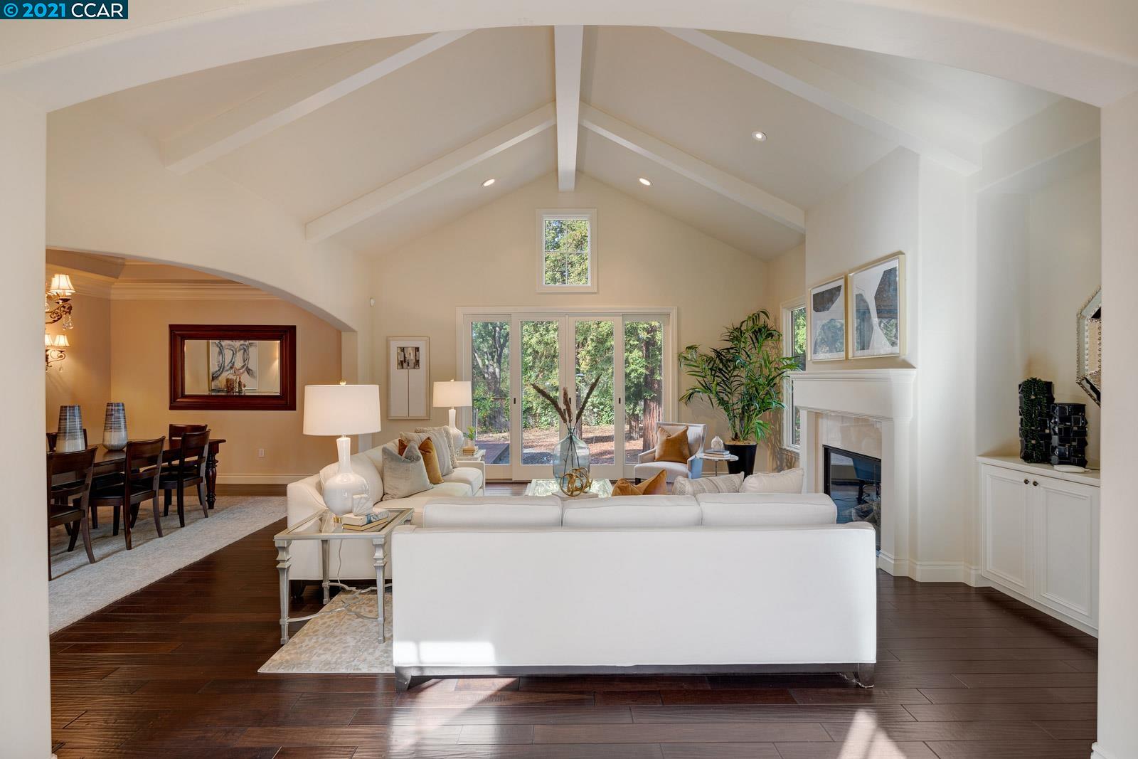 Undisclosed Address Diablo, CA 94526 - Photo 8 of 40 a living room with fireplace furniture and a large window
