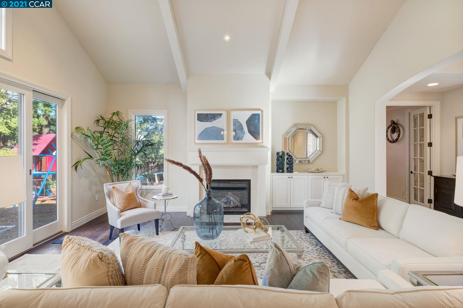 Undisclosed Address Diablo, CA 94526 - Photo 10 of 40 a living room with furniture or couch and a fireplace