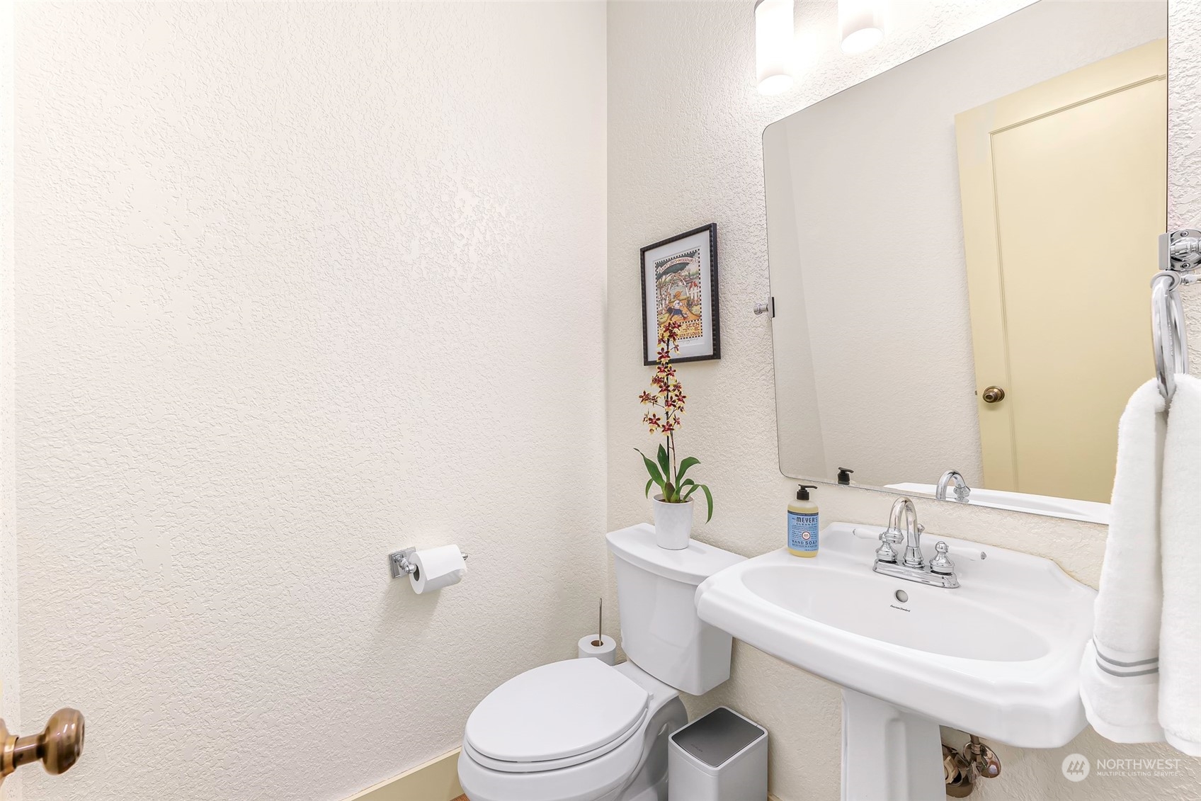 4384 Salmon Run Road Anacortes, WA 98221 - Photo 13 of 34 a bathroom with a sink a toilet and mirror