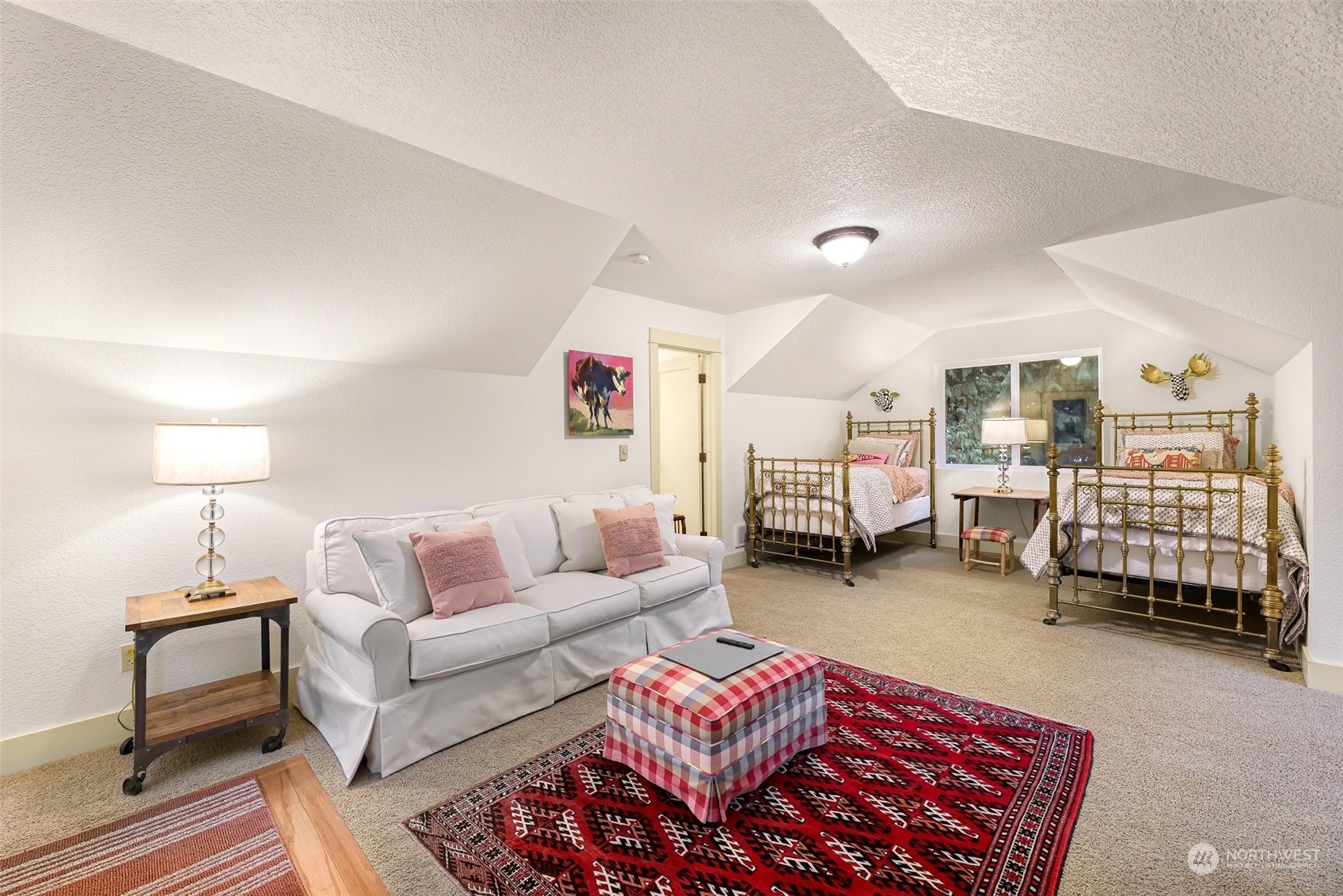 4384 Salmon Run Road Anacortes, WA 98221 - Photo 22 of 34 a living room with furniture and a lamp
