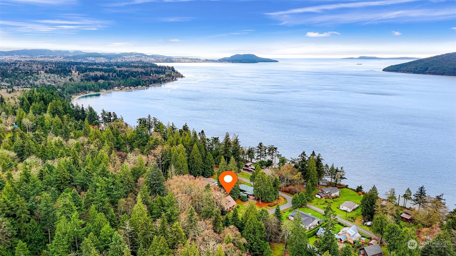 4384 Salmon Run Road Anacortes, WA 98221 - Photo 25 of 34 a view of a lake and mountain