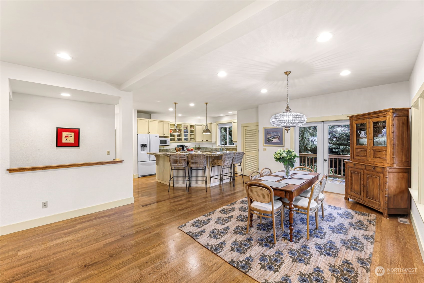 4384 Salmon Run Road Anacortes, WA 98221 - Photo 5 of 34 a dining room with furniture and wooden floor
