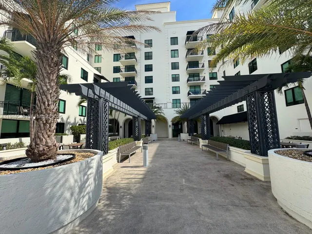 a view of a city with tall buildings