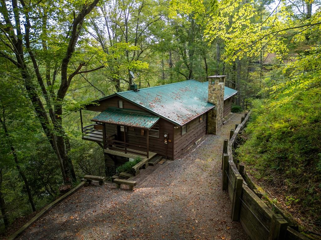 an aerial view of a house having yard