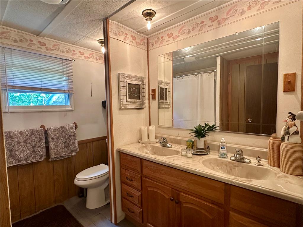 381 Red Oak Lane Bath, PA 18014 - Photo 16 of 27 Dual vanities with integrated sinks complement the functional layout of this well-maintained bathroom.