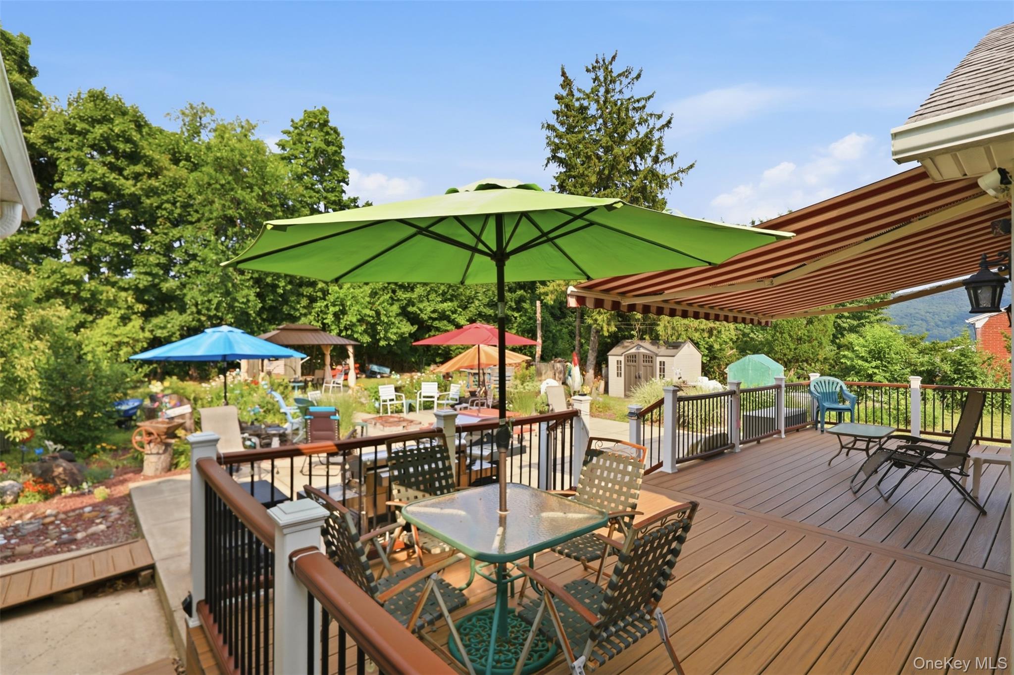 1 Hiko Place Fishkill, NY 12524 - Photo 37 of 41 Expansive outdoor deck featuring wood-finish flooring, white railing posts, and black balusters