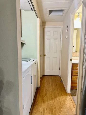 a bedroom with a bed and a ceiling fan