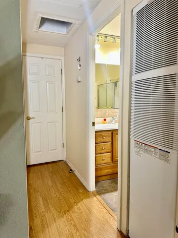 a bathroom with a tub and a sink