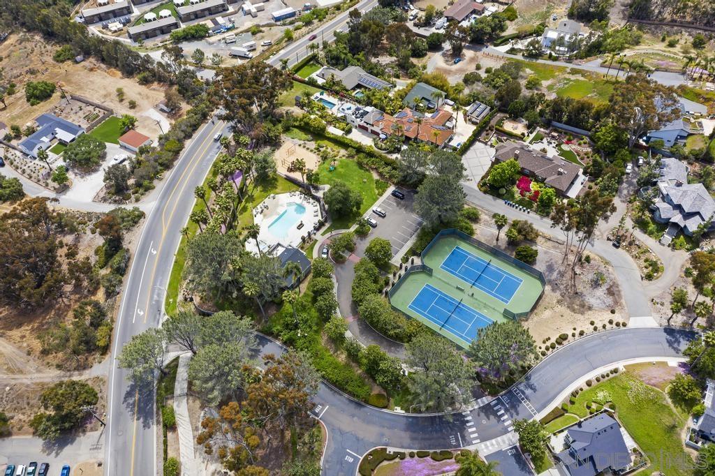1861 Pacific Ranch Drive Encinitas, CA 92024 - Photo 29 of 36 an aerial view of a house with a yard and lake view