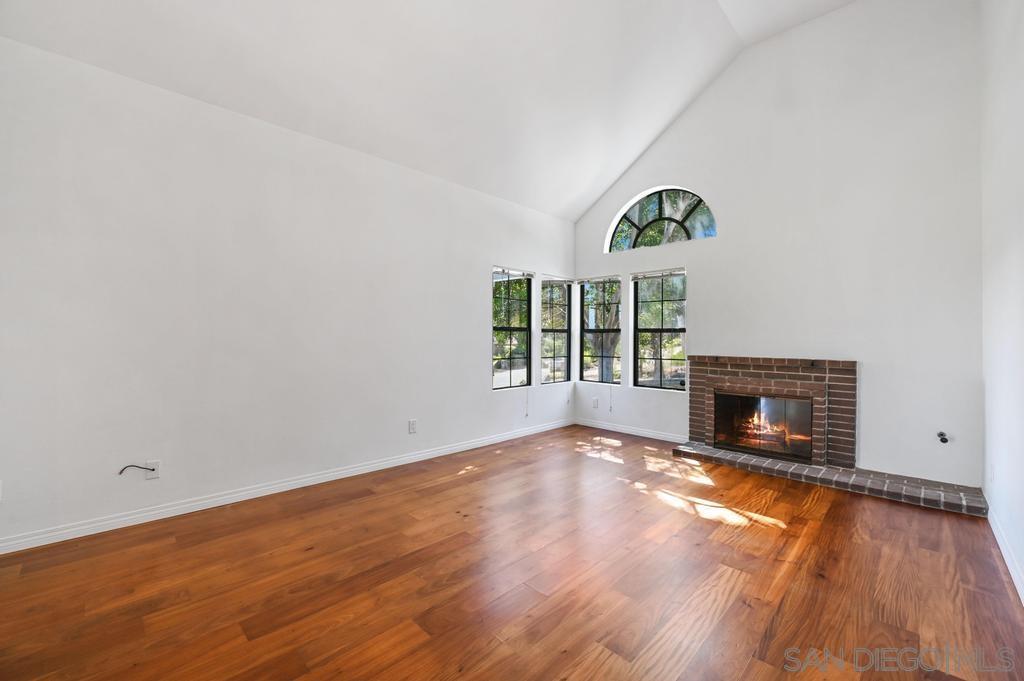 1861 Pacific Ranch Drive Encinitas, CA 92024 - Photo 8 of 36 a view of an empty room with a window and fire place