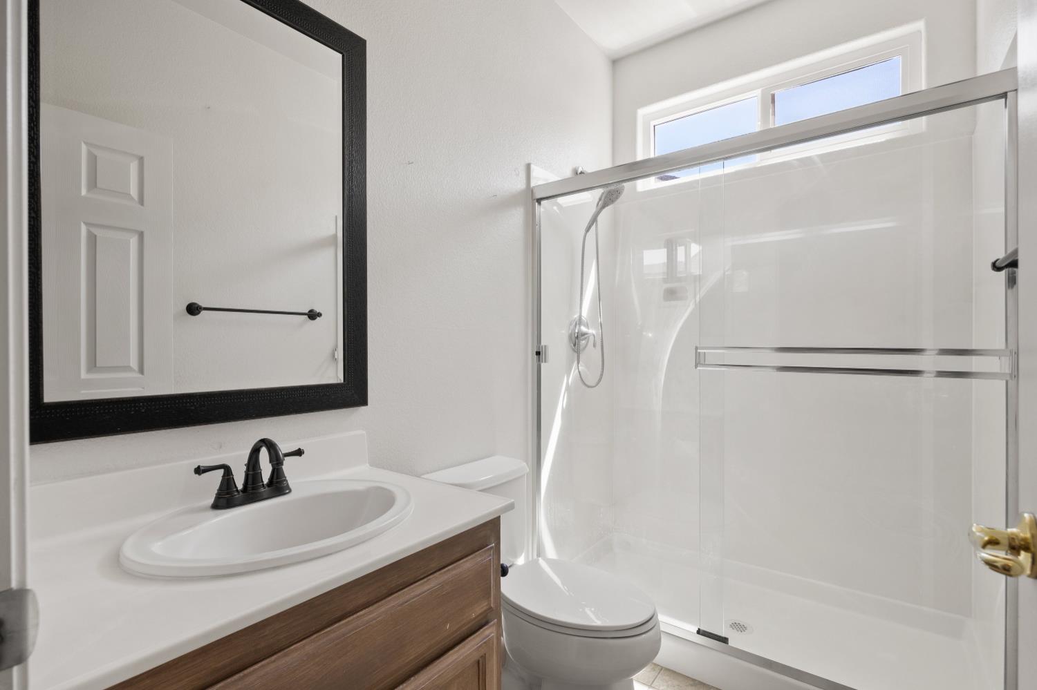 1325 Coby Lane Orland, CA 95963 - Photo 19 of 36 a bathroom with a sink toilet and shower