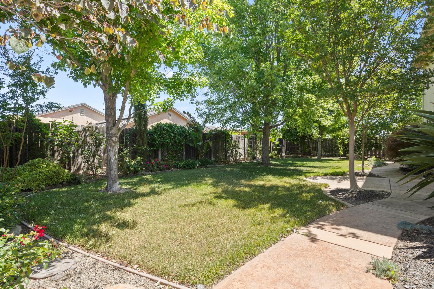 1325 Coby Lane Orland, CA 95963 - Photo 27 of 36 a backyard of a house with lots of green space