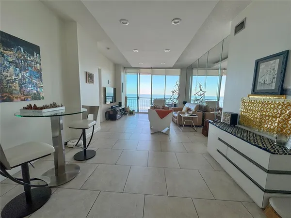 a living room with furniture and a window