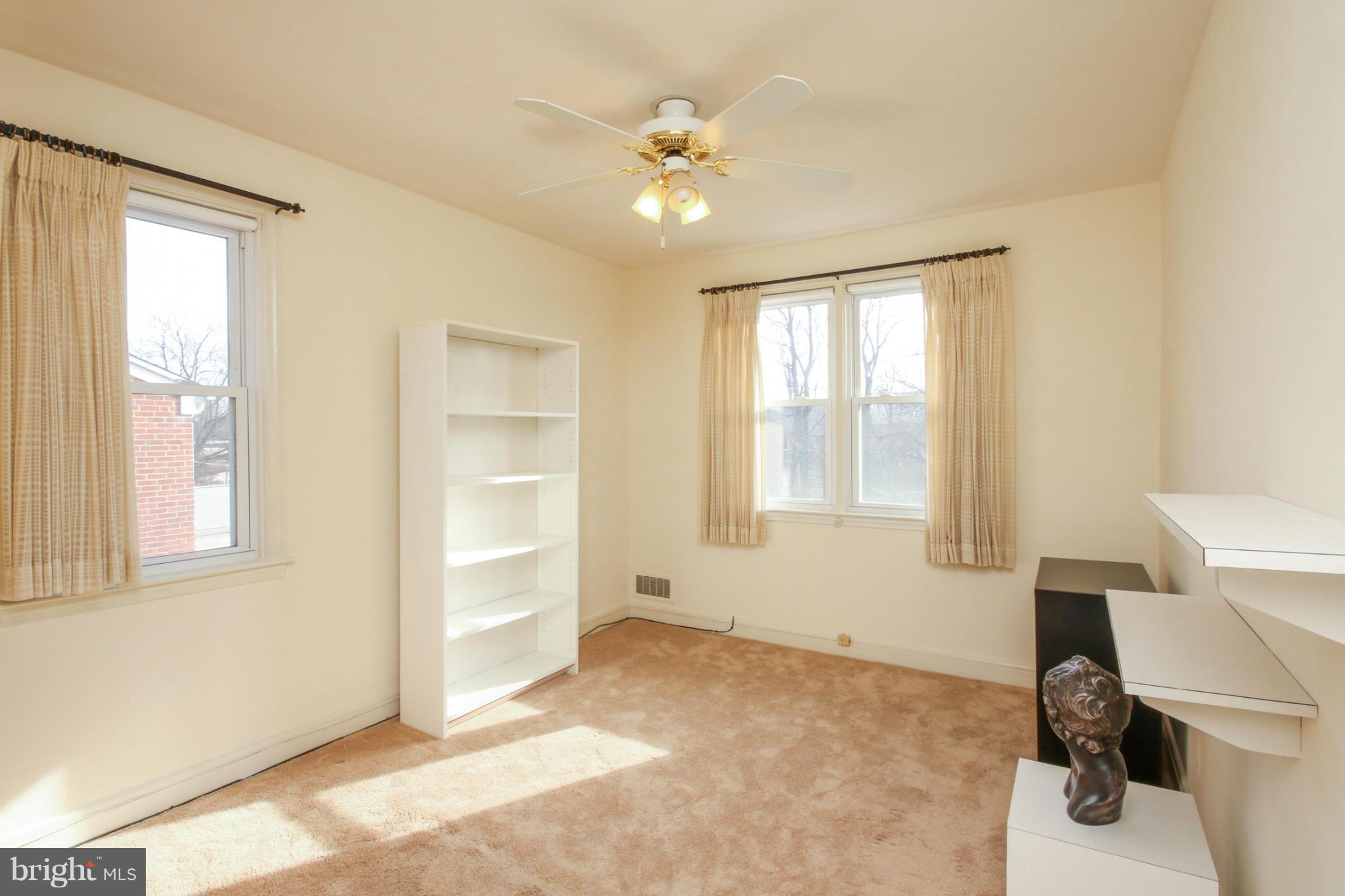 3919 Fallstaff Road Baltimore, MD 21215 - Photo 14 of 15 a view of an empty room with a window