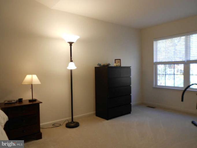 3025 Raking Leaf Drive Abingdon, MD 21009 - Photo 18 of 26 a room with a lamp and a window
