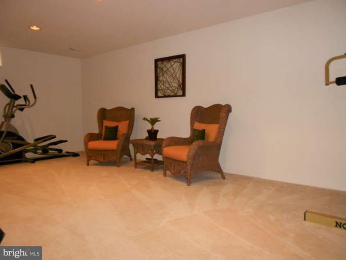 3025 Raking Leaf Drive Abingdon, MD 21009 - Photo 24 of 26 a living room with furniture and a chair