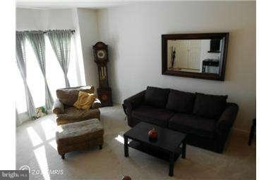 3025 Raking Leaf Drive Abingdon, MD 21009 - Photo 4 of 26 a living room with furniture and a window