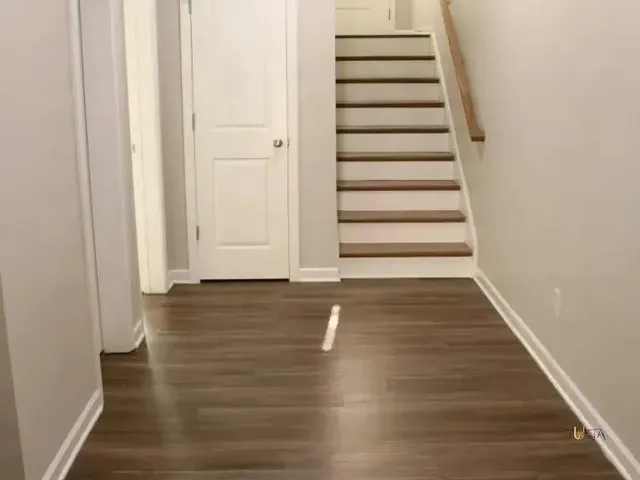 a view of a swimming pool with a bench in a patio