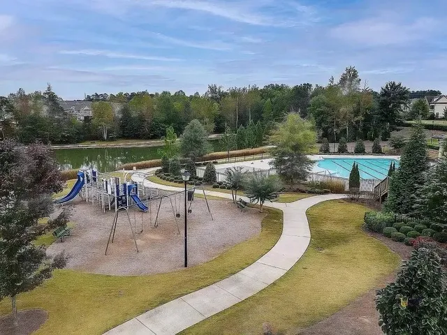 a aerial view of a house with a yard