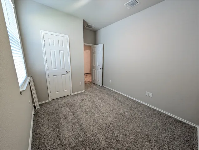 a view of a backyard with garden