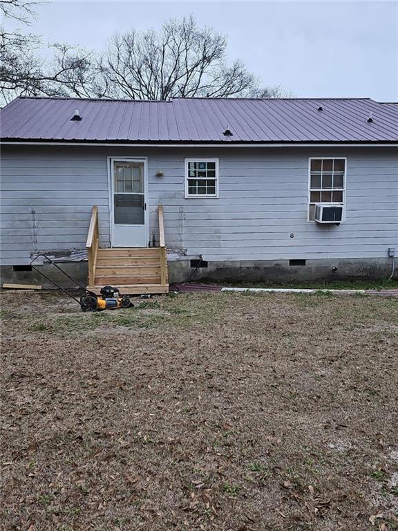 207 Fowler Street Swainsboro, GA 30401 - Photo 4 of 9 a view of a barn in the yard
