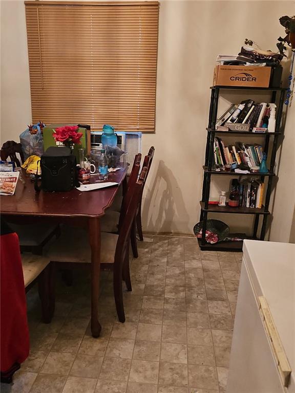 207 Fowler Street Swainsboro, GA 30401 - Photo 9 of 9 a view of a workspace with furniture