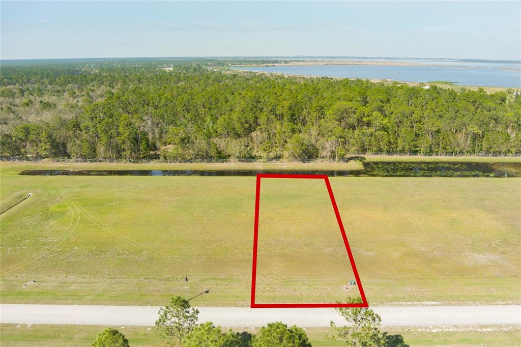 4540 Lindbergh Drive Frostproof, FL 33843 - Photo 2 of 14 a view of ocean from a balcony