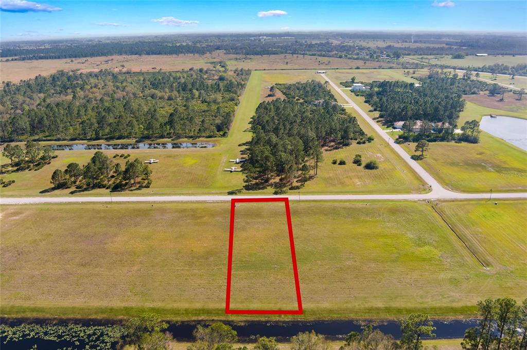 4540 Lindbergh Drive Frostproof, FL 33843 - Photo 3 of 14 a view of a swimming pool