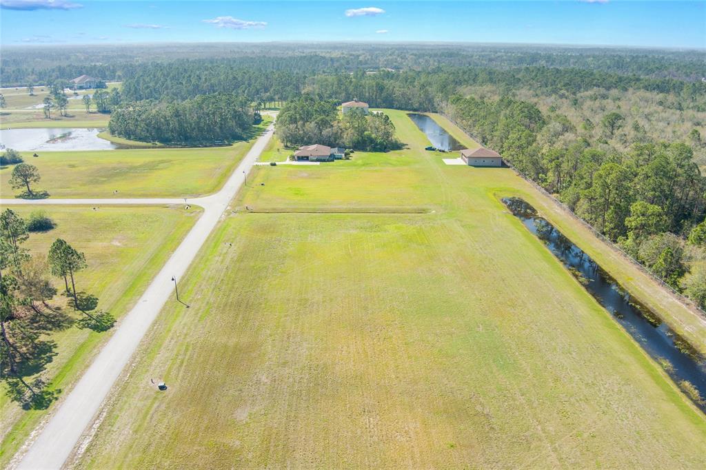 4540 Lindbergh Drive Frostproof, FL 33843 - Photo 5 of 14 a view of a swimming pool with an ocean view