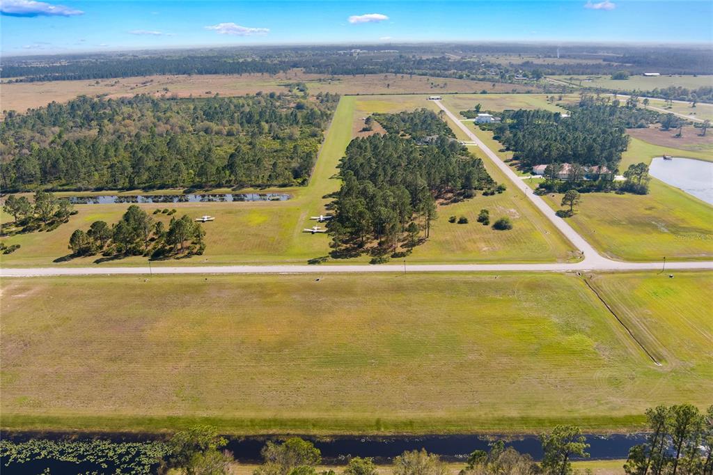 4540 Lindbergh Drive Frostproof, FL 33843 - Photo 7 of 14 a view of a lake
