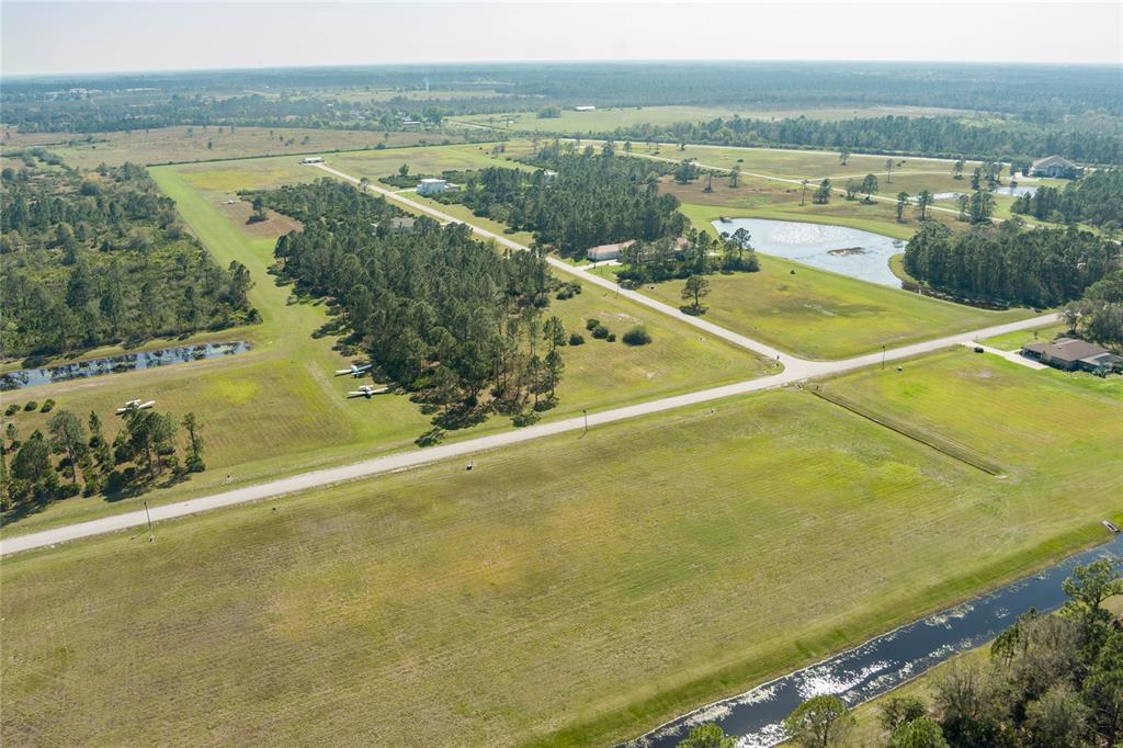 4540 Lindbergh Drive Frostproof, FL 33843 - Photo 10 of 14 a view of a tennis court