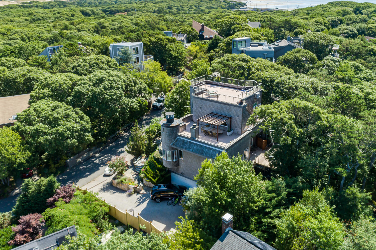 16 Thistlemore Road Provincetown, MA 02657 - Photo 1 of 27 an aerial view of a house with a yard