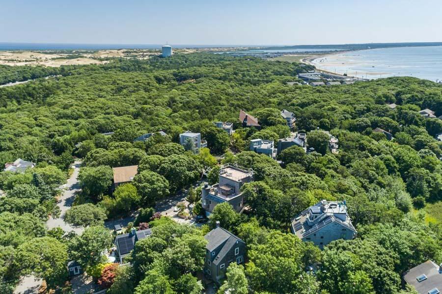 16 Thistlemore Road Provincetown, MA 02657 - Photo 11 of 27 an aerial view of a residential houses with outdoor space and trees all around