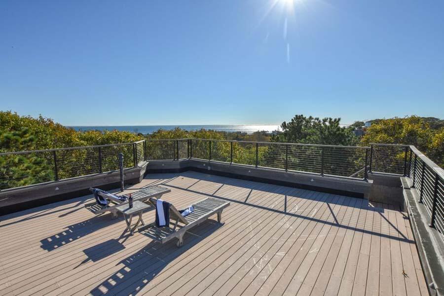 16 Thistlemore Road Provincetown, MA 02657 - Photo 12 of 27 a view of deck with furniture and city view