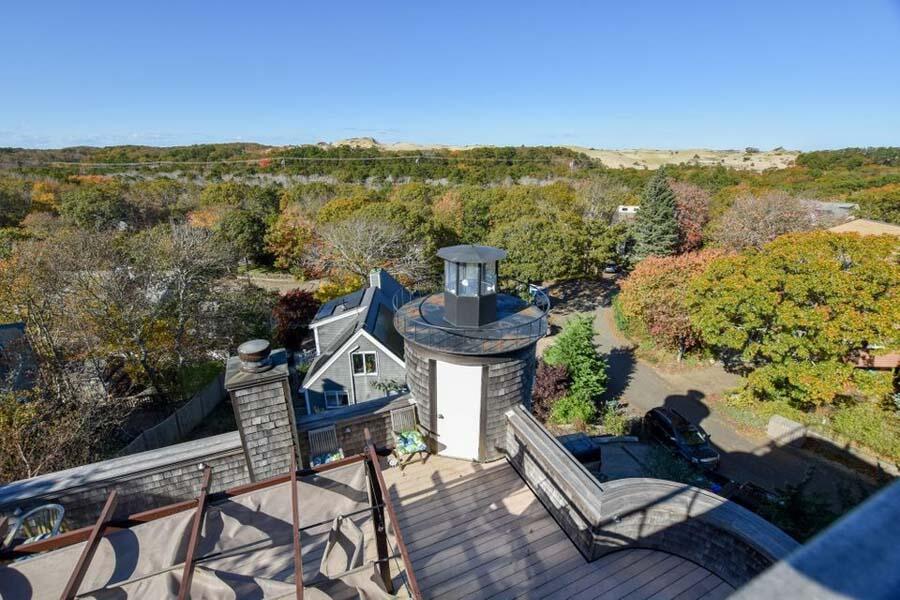 16 Thistlemore Road Provincetown, MA 02657 - Photo 9 of 27 a view of a city from a terrace